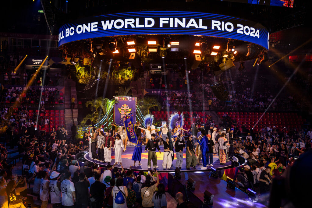 A view of the stage of Red Bull BC One World Final 2024 with all 32 competing dancers on the stage.